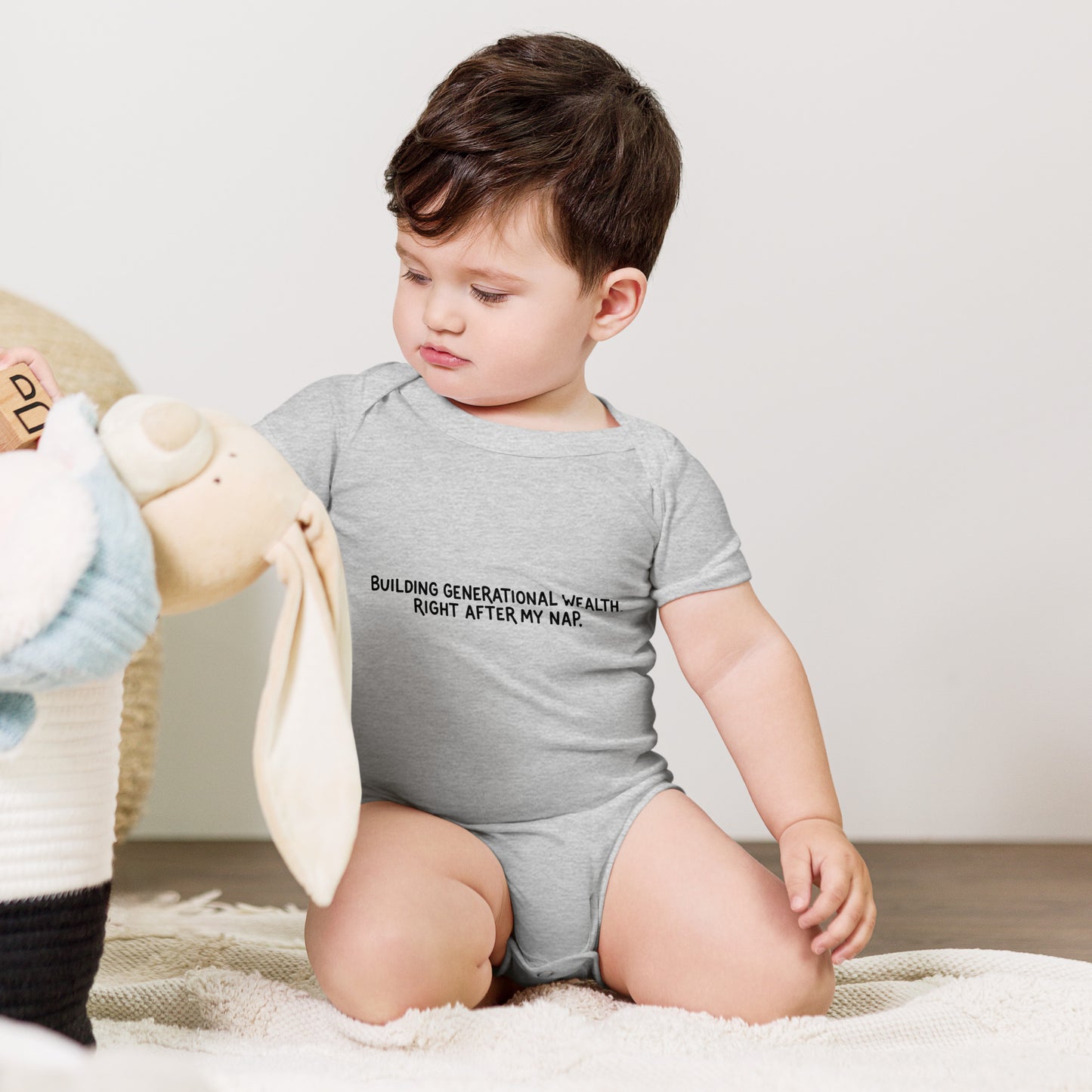 Baby bodysuit with the words Building generational wealth after nap