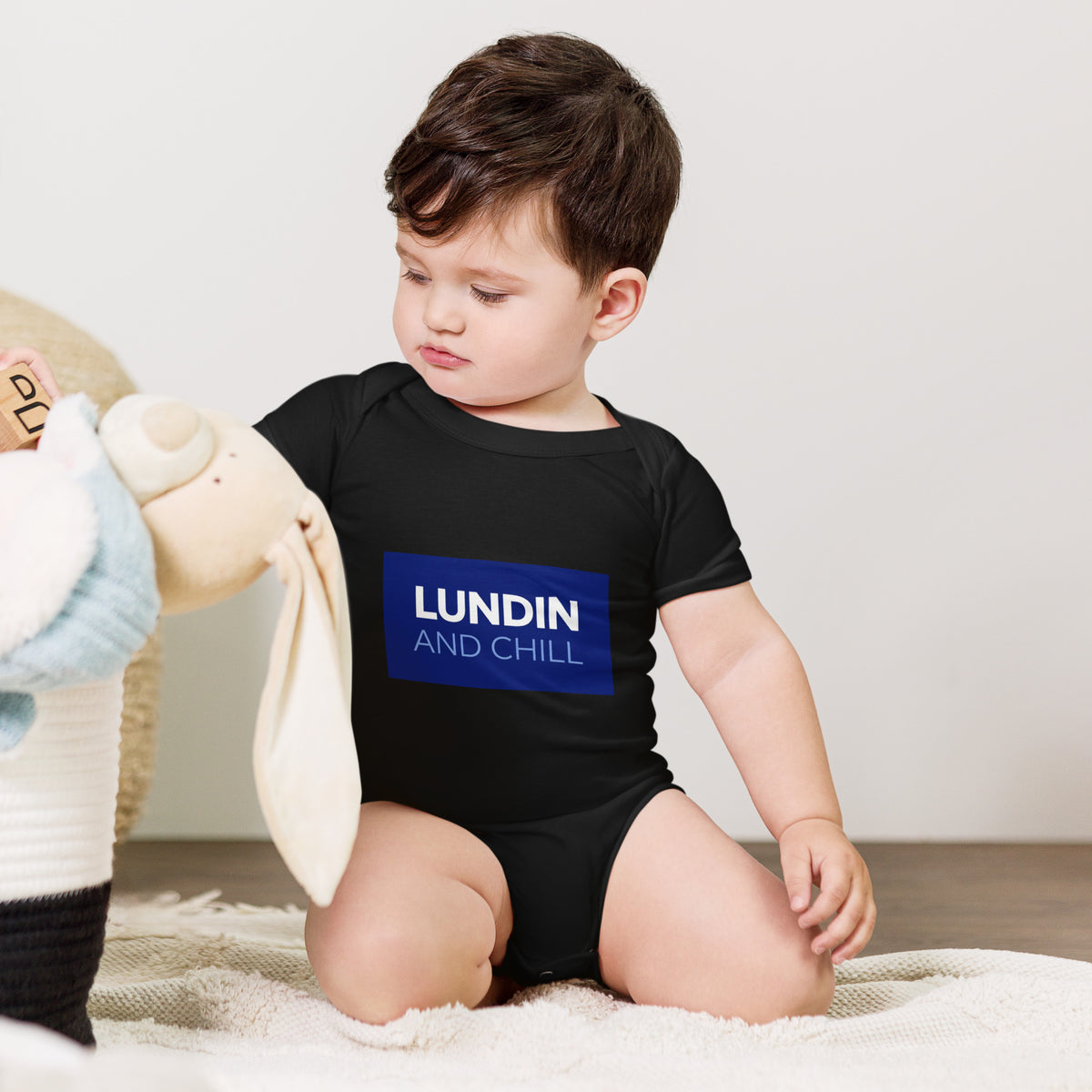 Baby bodysuit with the words Lundin and Chill in bold lettering