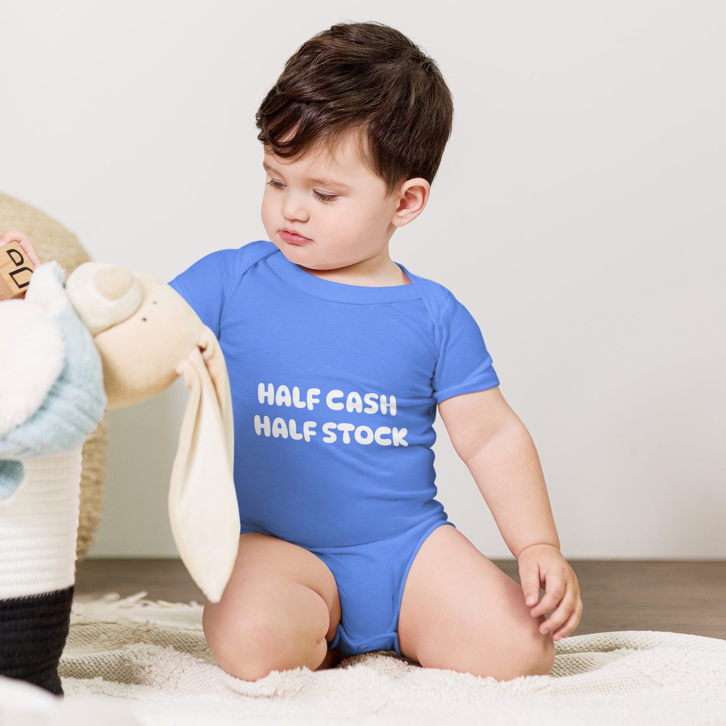 Baby bodysuit with the words Half Cash Half Stock