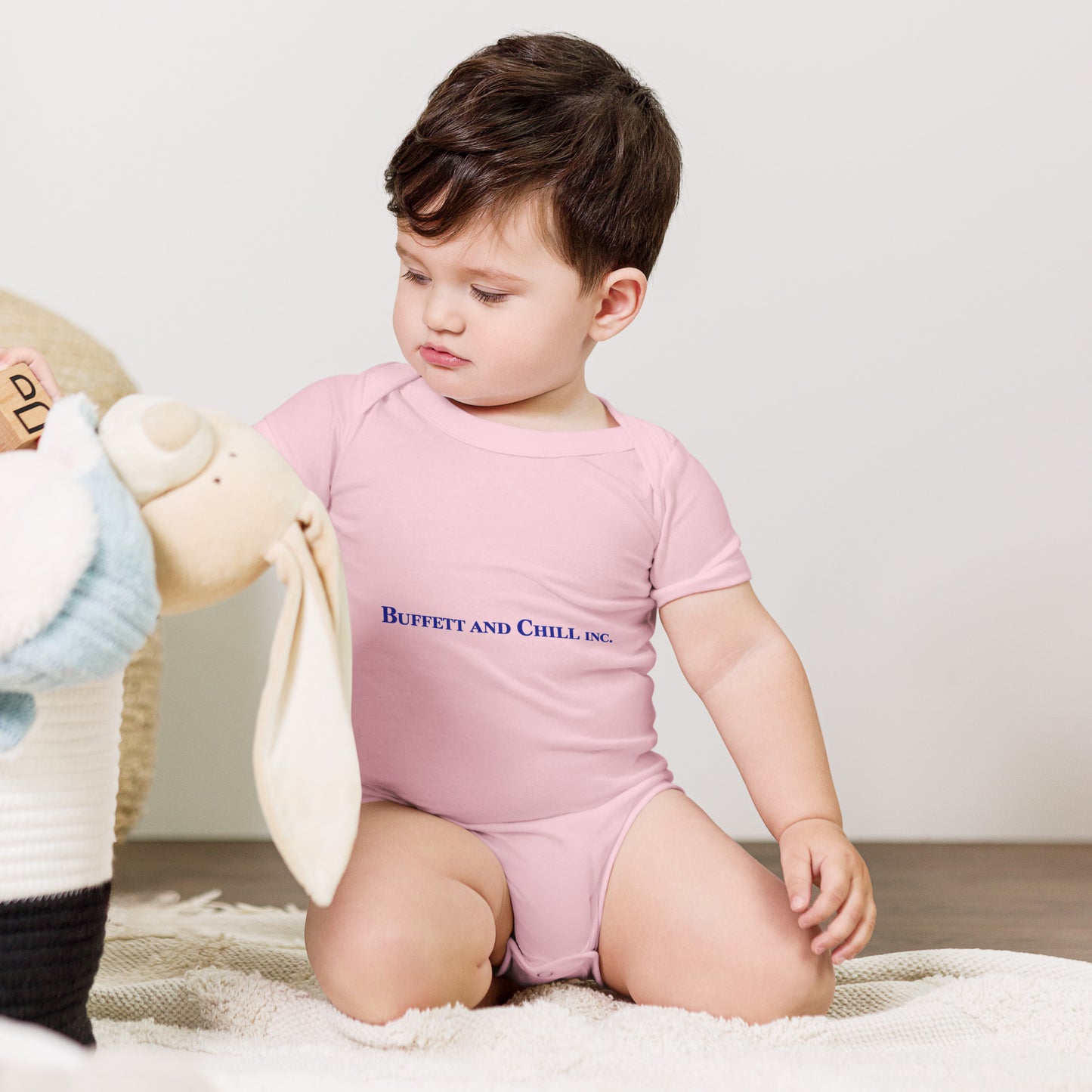 Baby bodysuit with the words Buffett and Chill Inc