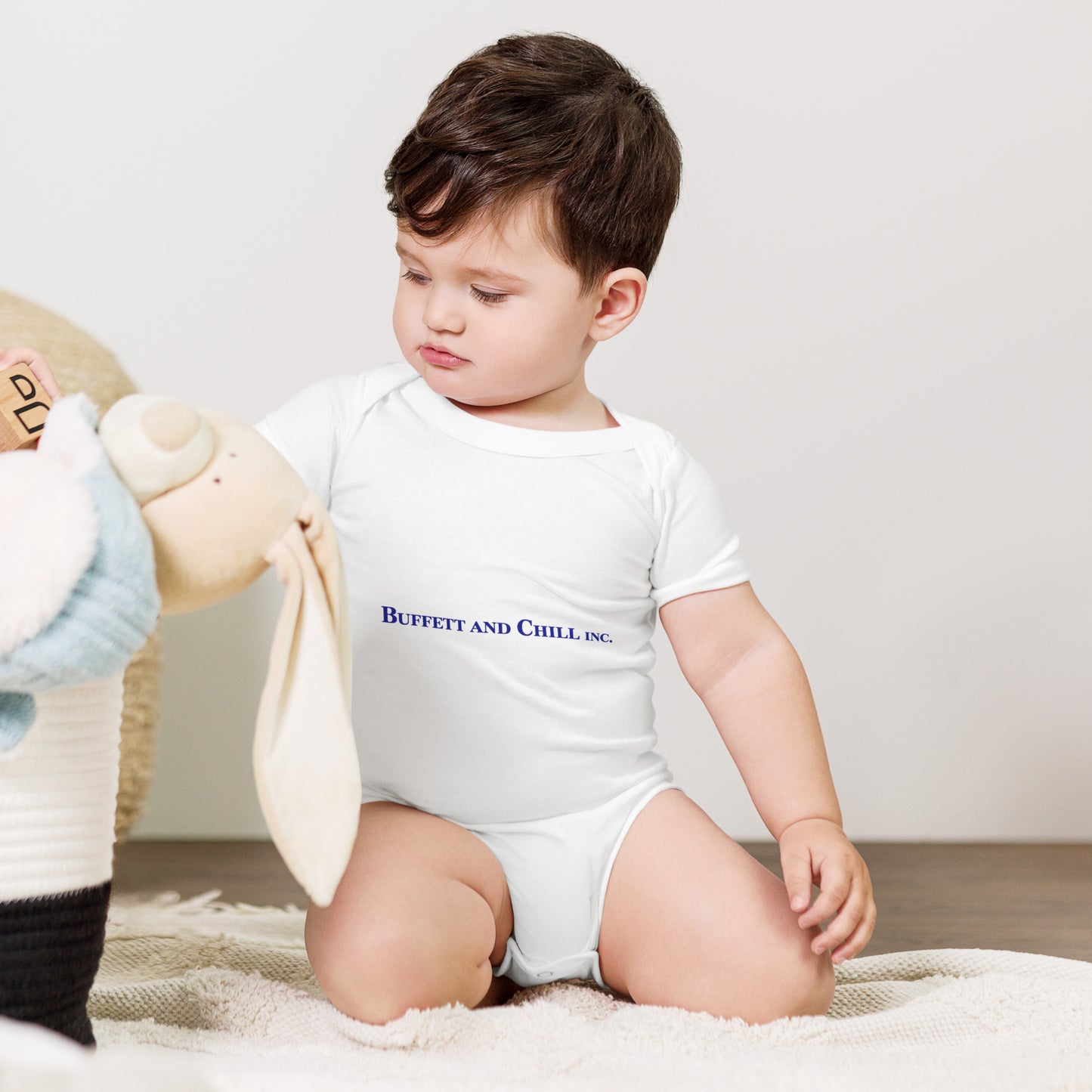 Baby bodysuit with the words Buffett and Chill Inc