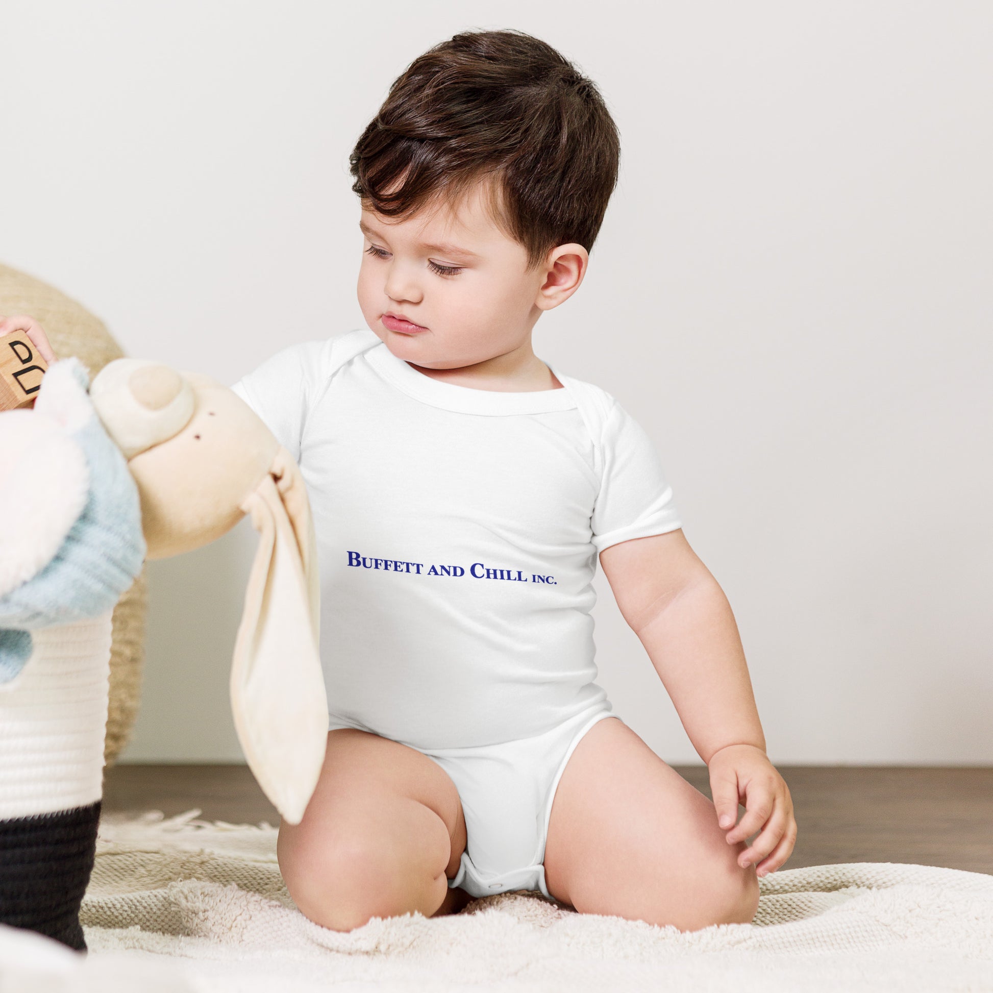 Baby bodysuit with the words Buffett and Chill Inc