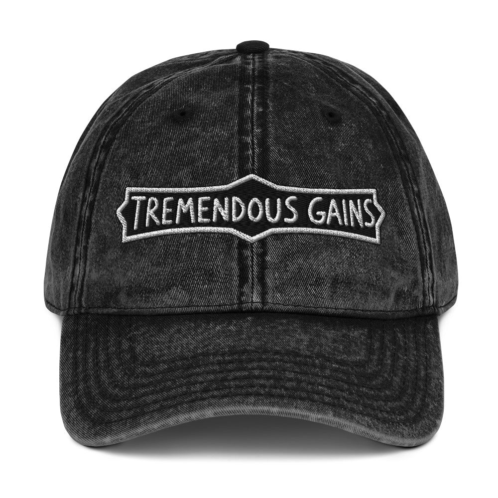 Vintage cotton twill cap with a hand-lettered Tremendous Gains sign design