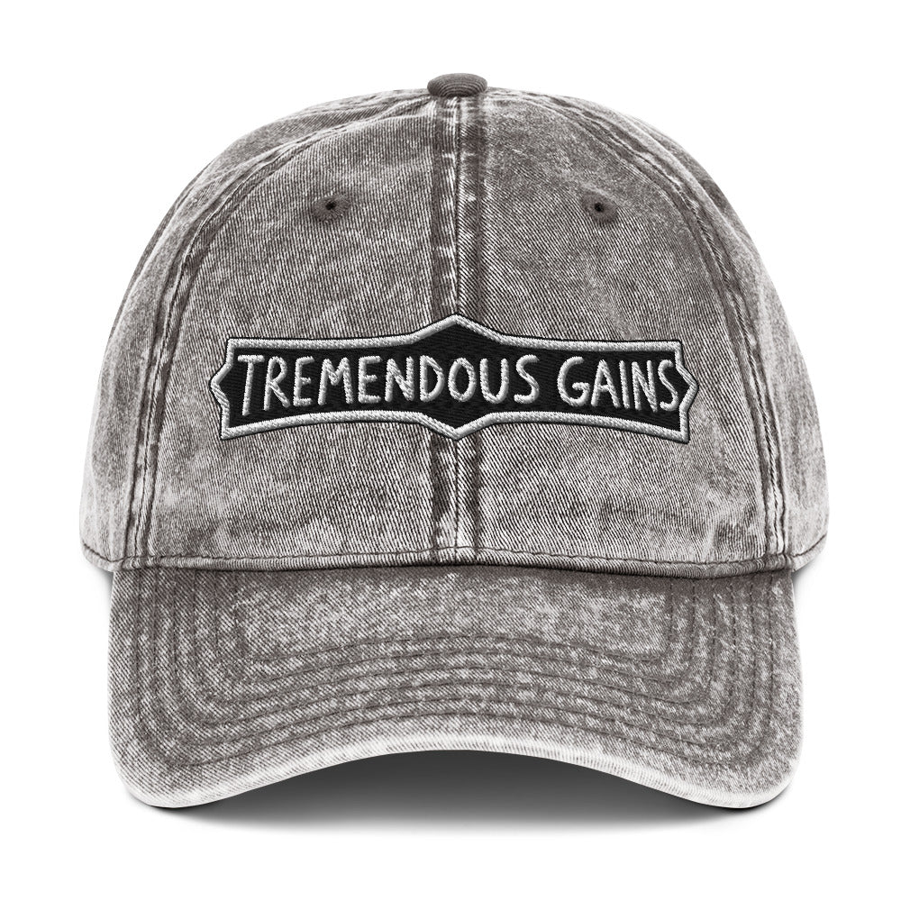 Vintage cotton twill cap with a hand-lettered Tremendous Gains sign design