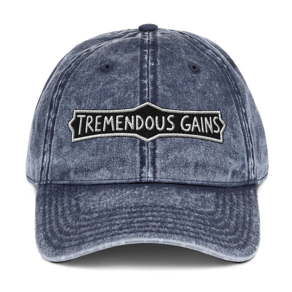 Vintage cotton twill cap with a hand-lettered Tremendous Gains sign design