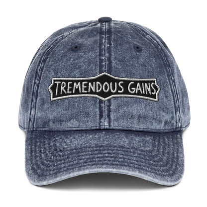 Vintage cotton twill cap with a hand-lettered Tremendous Gains sign design