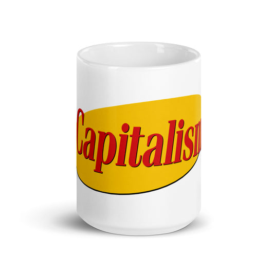 "Capitalism" in yellow oval retro sitcom-style lettering on a ceramic mug
