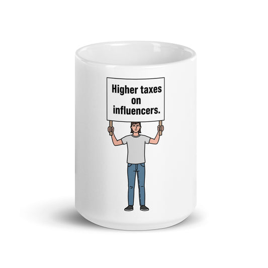 Ceramic mug with a printed slogan reading Higher Taxes on Influencers.
